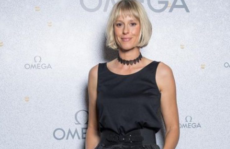 Federica Pellegrini fuga spiaggia trema costume